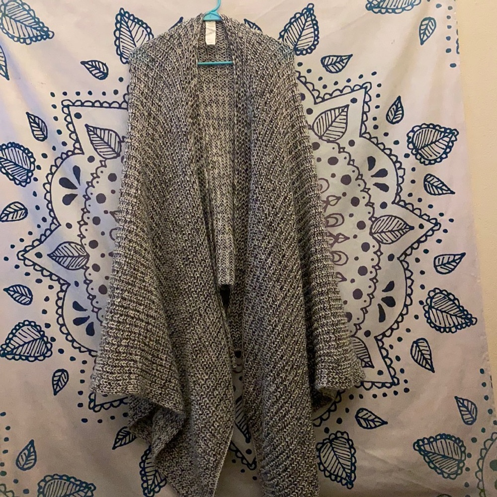 This is a shawl/ cardigan! It can double as a blanket as well! Worn once!